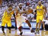 Miami Heat's James drives through Indiana Pacers' defense during their NBA Eastern Conference final basketball playoff in Miami