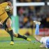 Australia's Ashley-Cooper breaks tackle of Argentina's Bosch during Rugby Championship match at Skilled Park, Gold Coast