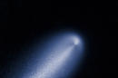 In this photo provided by NASA, a contrast-enhanced image produced from the Hubble images of comet ISON taken April 23, 2013 reveals the subtle structure in the inner coma of the comet. In this computer-processed view, the Hubble image has been divided by a computer model coma that decreases in brightness proportionally to the distance from the nucleus, as expected for a comet that is producing dust uniformly over its surface. ISON's coma shows enhanced dust particle release on the sunward-facing side of the comet's nucleus, the small, solid body at the core of the comet. This information is invaluable for determining the comet's shape, evolution, and spin of the solid nucleus. (AP Photo/NASA)