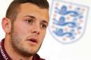 England's midfielder Jack Wilshere speaks to the media during a press conference at Saint George's Park in central England, on September 5, 2014