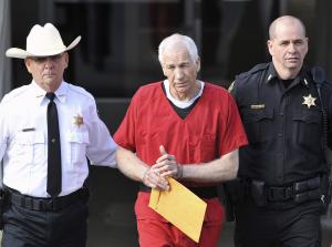 Files of Jerry Sandusky leaving the Centre County Courthouse …