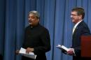 U.S. Defense Secretary Ash Carter and India's Defense Minister Manohar Parrikar leave a joint press conference after their meeting at the Pentagon in Washington