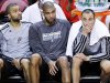 Spurs' Parker, Duncan, and Ginobili sit on the bench during their loss to the Heat in Game 2 of their NBA Finals basketball playoff in Miami