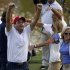 U.S. Bradley celebrates next to Mickelson and Amy after defeating Team Europe golfers McIlroy and McDowell on the 17th hole during the afternoon four-ball round at the 39th Ryder Cup matches at the Medinah Country Club
