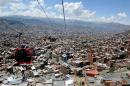 A cable-car travels over La Paz, on October 10, 2014