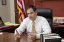 In this photo taken Feb. 7, 2013, Sen. Marco Rubio, R-Fla. gestures as he speaks during an interview with The Associated Press in his office on Capitol Hill in Washington. President Barack Obama's 