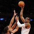New York Knicks' Amare Stoudemire, right, shoots over Portland Trail Blazers' LaMarcus Aldridge and Jared Jeffries, rear, during the first quarter of an NBA basketball game, Tuesday, Jan. 1, 2013, at Madison Square Garden in New York. (AP Photo/Bill Kostroun)