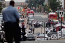 Emergency vehicles and law enforcement respond to a shooting at the Washington Navy Yard September 16, 2013