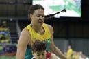 Australia center Liz Cambage, rear, battles Japan guard Sanae Motokawa for the rebound during the first half of a women's basketball game at the Youth Center at the 2016 Summer Olympics in Rio de Janeiro, Brazil, Thursday, Aug. 11, 2016. (AP Photo/Carlos Osorio)