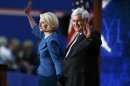 Newtr and Callista Gingrich wave after addressing the final session of the Republican National Convention in Tampa