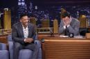 In this photo provided by NBC, Jimmy Fallon appears with Will Smith, left, during his "The Tonight Show" debut on Monday, Feb. 17, 2014, in New York. Fallon departed from the network's 