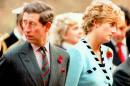 FILE - In this file photo taken on Wednesday, Dec. 20, 1992, Britain's Prince Charles and Princess Diana, look their separate ways, during a memorial service on their tour of South Korea. Prince Charles is readying the paperwork to claim his pension when he turns 65 on Thursday, Nov. 14, 2013, but he still hasn't started the job he was born to do. (AP Photo/File)