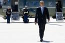 President Barack Obama walks from Marine One to board Air Force One and leave Los Angeles en route to Washington from Los Angeles International Airport Thursday, July 24, 2014, on the final day of his three-day West Coast trip. (AP Photo)