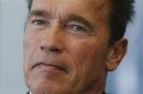 File of actor and former California governor Schwarzenegger presents his book 'Total Recall' during a news conference during the book fair in Frankfurt