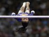 Gabby Douglas competes on the uneven bars during the final round of the women's Olympic gymnastics trials, Sunday, July 1, 2012, in San Jose, Calif. (AP Photo/Jae C. Hong)