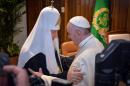 Pope Francis (R) and the head of the Russian Orthodox Church, Patriarch Kirill, greet each other during a historic meeting in Havana on February 12, 2016