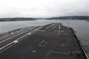 US Navy handout photo of the aircraft carrier John C. Stennis returning to Bremerton