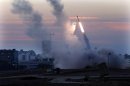 The Iron Dome defense system fires to interecpt incoming missiles from Gaza in the port town of Ashdod, Thursday, Nov. 15, 2012. Israel's prime minister Benjamin Netanyahu said Thursday that the army is prepared for a 