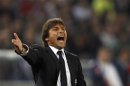 Juventus coach Conte reacts during the match against Napoli in their Italian Cup final at the Olympic stadium in Rome