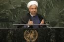 Iranian President Rouhani gestures at the conclusion of his address to the 69th UN General Assembly at the UN Headquarters in New York