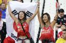 South Korea fans hold a flag as they cheer prior to the group H World Cup soccer match between South Korea and Belgium at the Itaquerao Stadium in Sao Paulo, Brazil, Thursday, June 26, 2014. (AP Photo/Lee Jin-man)