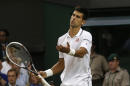Novak Djokovic of Serbia gestures after a line call during his men's singles match against Jo-Wilfried Tsonga of France at the All England Lawn Tennis Championships in Wimbledon, London, Monday, June 30, 2014. (AP Photo/Pavel Golovkin)