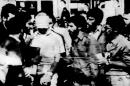 A blindfolded US hostage is paraded by captors at the US Embassy in Tehran, Iran, on November 8, 1979