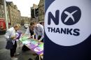 Supporters of the pro-union "Better Together" campaign distribute information in Edinburgh on September 8, 2014