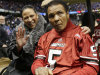 FILE - In this Jan. 2, 2013, file photo, former boxing legend Muhammad Ali arrives at the Sugar Bowl football game in New Orleans. Muhammad Ali's daughter knocked down rumors of her father being near death Sunday, Feb. 3, 2013, saying he was at home watching NFL football's Super Bowl. (AP Photo/Dave Martin, File)