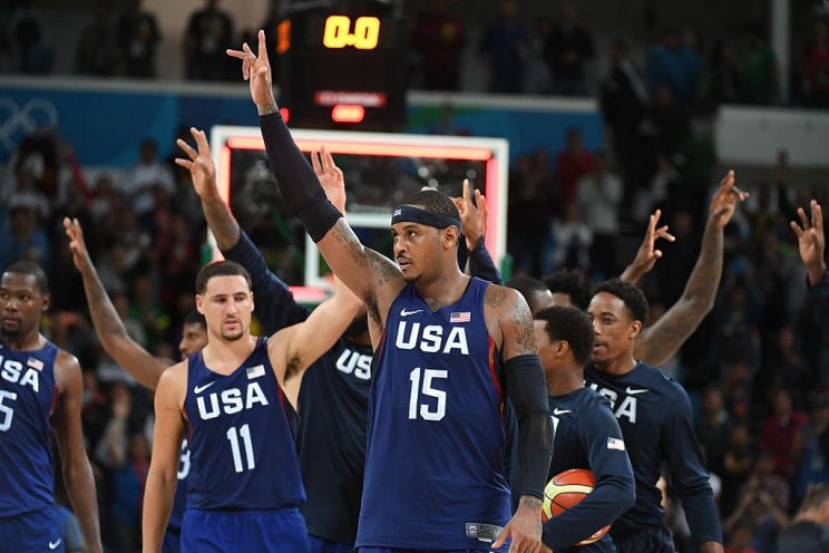 Carmelo Anthony and Team USA celebrates after defeating Australia 98-88 Wednesday in Rio. (Getty)
