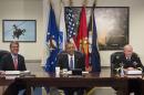 President Barack Obama holds a meeting with Secretary of Defense Ashton Carter (L), Chairman of the Joint Chiefs of Staff Martin Dempsey (R) and top military officials at the Pentagon, July 6, 2015