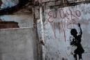 A graffiti reading "I want to live" is seen at a shantytown of the Alemao complex in Rio de Janeiro, Brazil on April 8, 2015