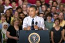 President Barack Obama speaks to students and parents at Washington-Lee High School in Arlington, Va., Friday, May 4, 2012, about his efforts to prevent interest rates from doubling on federal student loans. (AP Photo/J. Scott Applewhite)