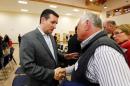 Senator Ted Cruz greets supporter Earl Spruce at the Strafford County Republican Committee Chili and Chat in Barrington