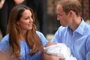 Prince William and Catherine, Duchess of Cambridge show their newborn baby boy to the world in London on July 23, 2013