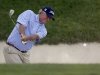 Russ Cochran hits out of a bunker on the ninth hole during the second round of the 74th Senior PGA Championship golf tournament at Bellerive Country Club Friday, May 24, 2013, in St. Louis. (AP Photo/Jeff Roberson)