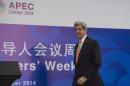 U.S. Secretary of State John Kerry arrives to give a press conference at the Asia-Pacific Economic Cooperation (APEC) meeting in Beijing, China Saturday, Nov. 8, 2014. (AP Photo/Nicholas Kamm, Pool)
