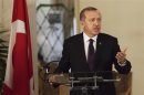 Turkey's Prime Minister Tayyip Erdogan speaks to the media during a meeting with Senegal's President Macky Sall at the presidential palace in Daka