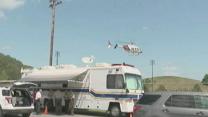 Raw: Emergency Crews Arrive at Jet Crash Scene